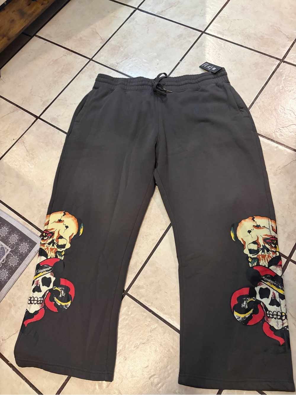 Ed Hardy Black Sweatpants with Red and Yellow Skull Graphics